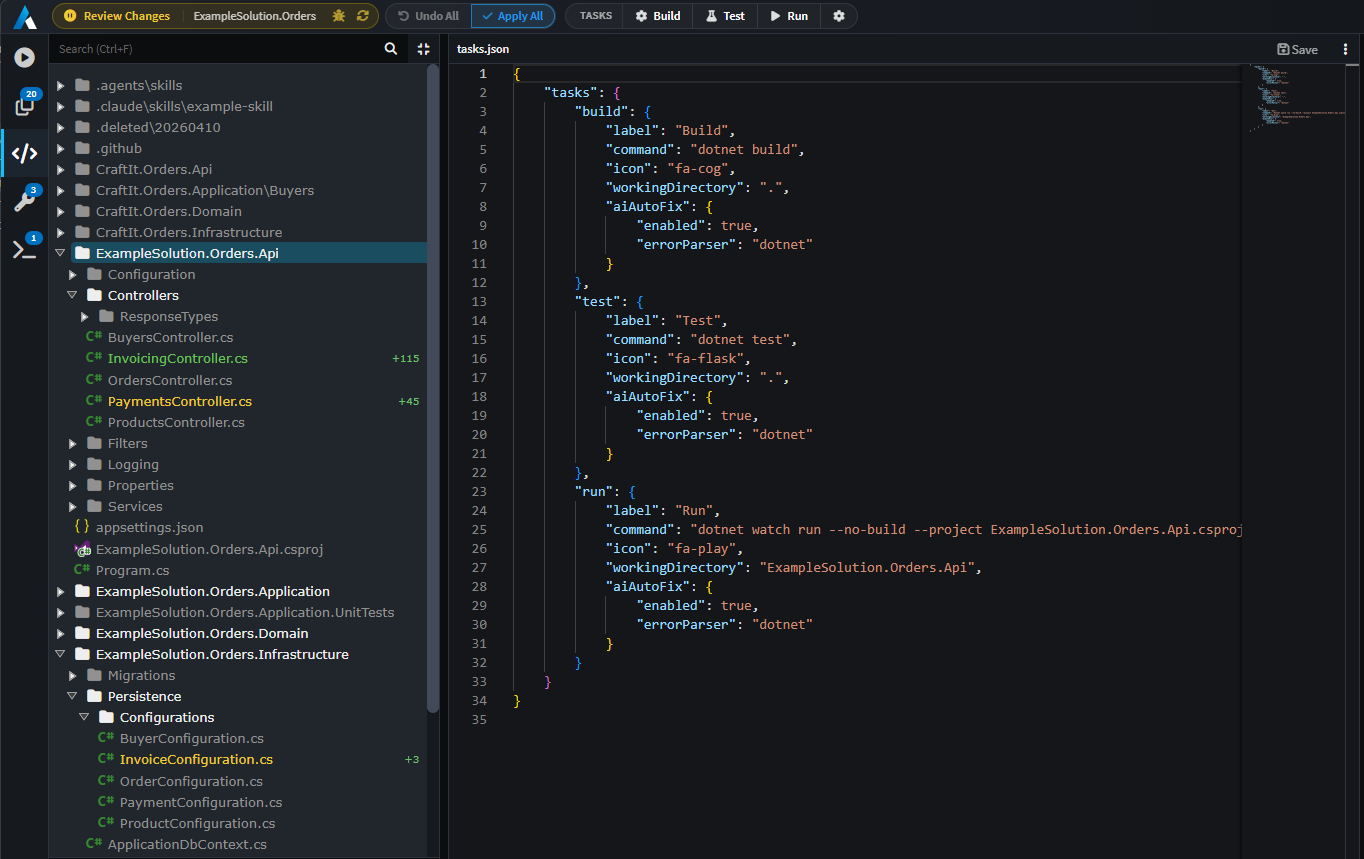tasks.json open in the editor with build, test, and run task definitions